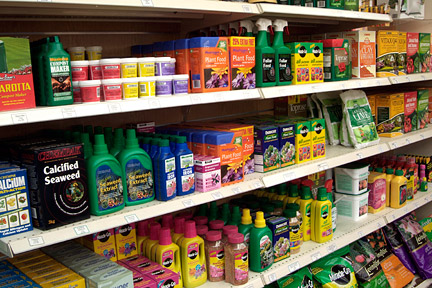 A selection of fertilisers in a garden centre. Image: RHS/Tim Sandall